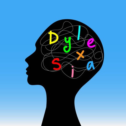 Silhouette of a head with colorful, tangled lines inside, spelling "Dyslexia" in bright letters against a blue background.