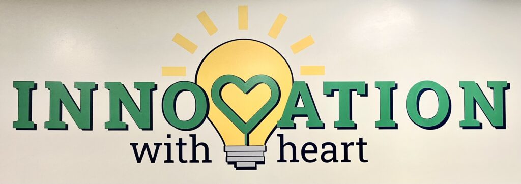 This image shows the Innovation Lab's logo; Innovation with Heart.